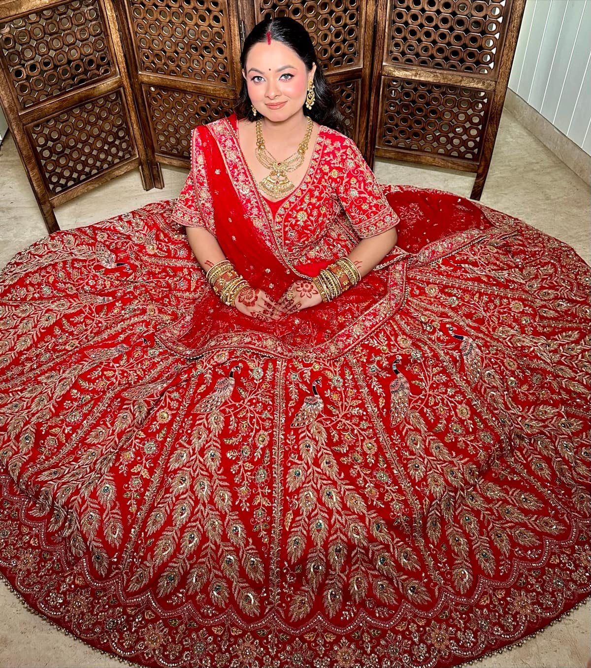 Flared Royal Peacock Bridal Lehenga — bridal makeup by Makeovers by Bhuvita, Chandigarh