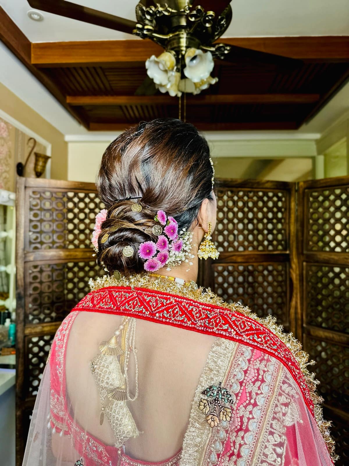 Romantic Textured Low Bun Bridal Styling — bridal makeup by Makeovers by Bhuvita, Chandigarh