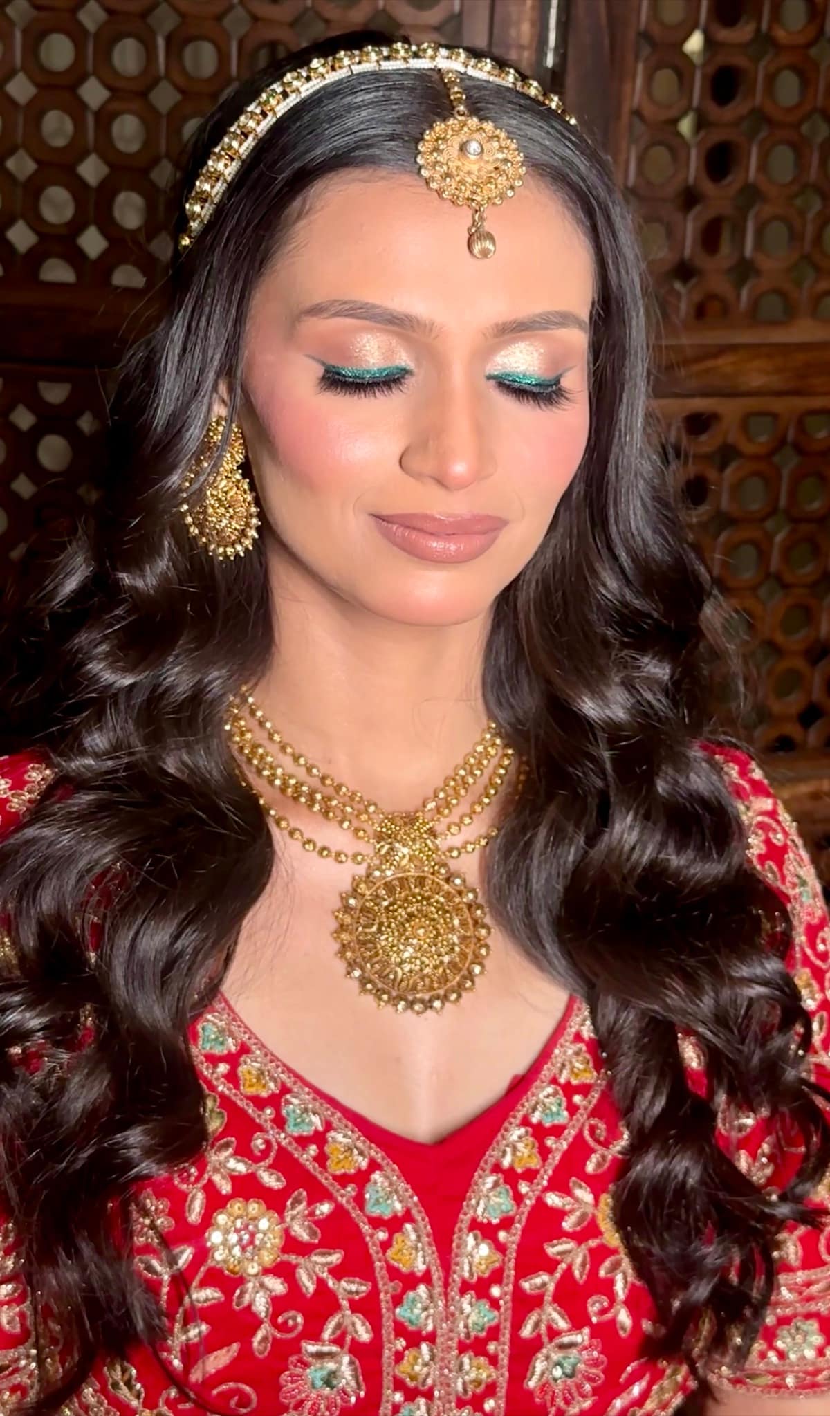 Teal Winged Eyeliner & Open Hollywood Waves Bridal Glam — bridal makeup by Makeovers by Bhuvita, Chandigarh