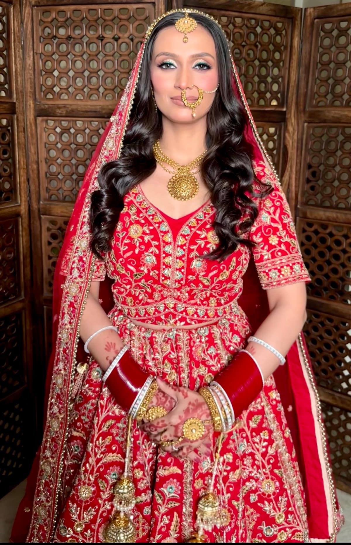 Modern Bride with Pop-of-Colour Teal Wing — bridal makeup by Makeovers by Bhuvita, Chandigarh